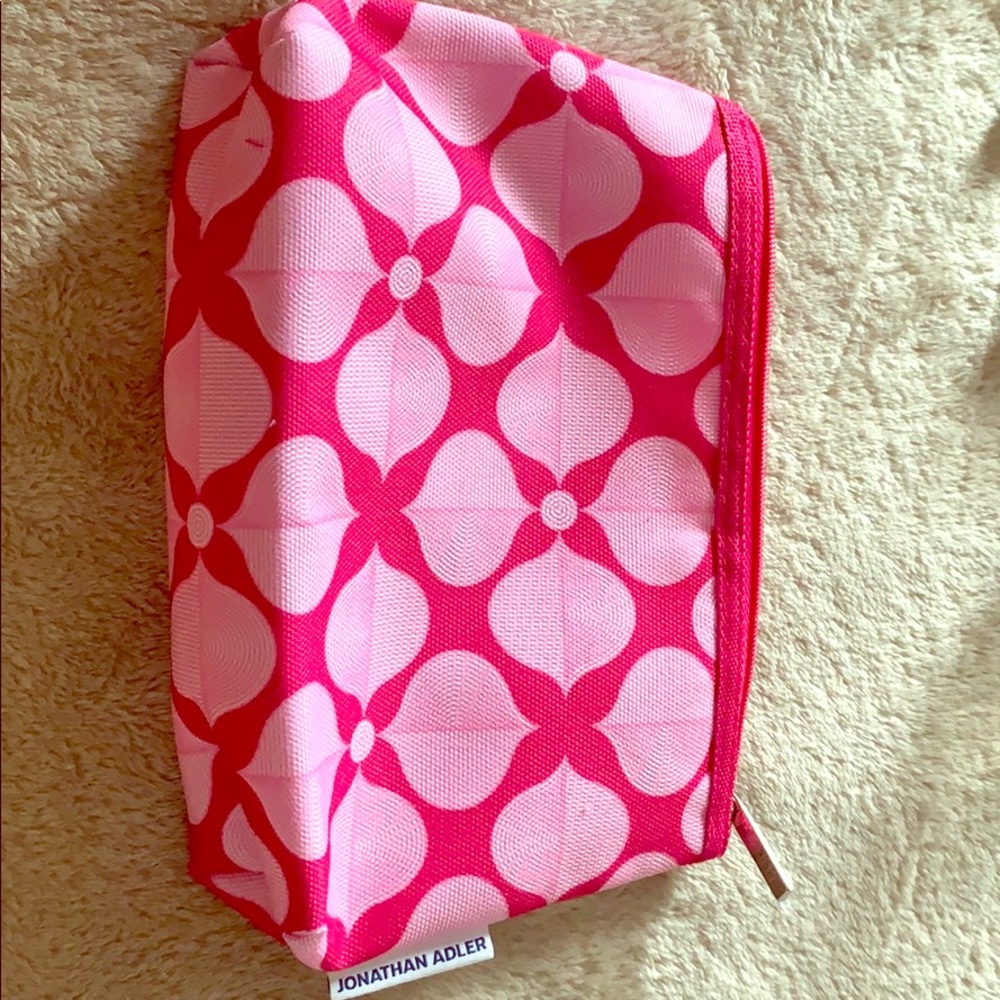 Pink floral Clinique cosmetics bag